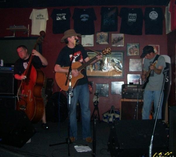HTH performing at a bar